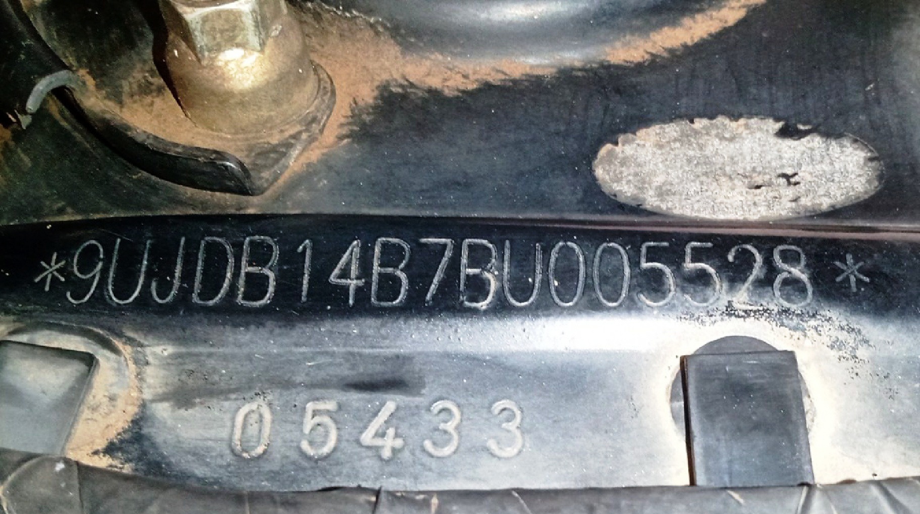 Exemplo de numeração gravada a laser (referência visual)